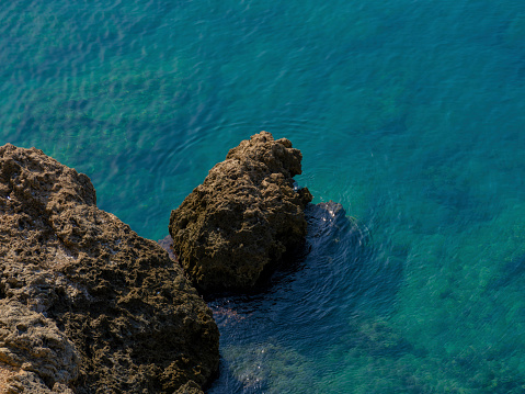 cliffs and blue sea on the beach