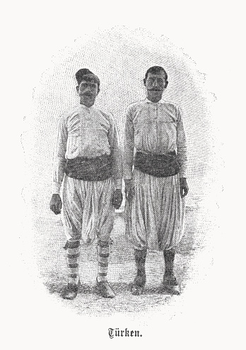 Two Turks from the Ottoman Empire period at the end of the 19th century. Halftone print after a drawing, published in 1899.