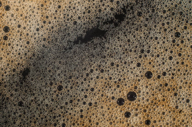 istock Air bubble foam formed on freshly flavored black coffee. 1445133357