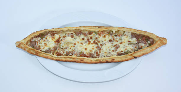 istock turkish pizza with roasted meat and cheese .Turkish pide, pita 1445134716