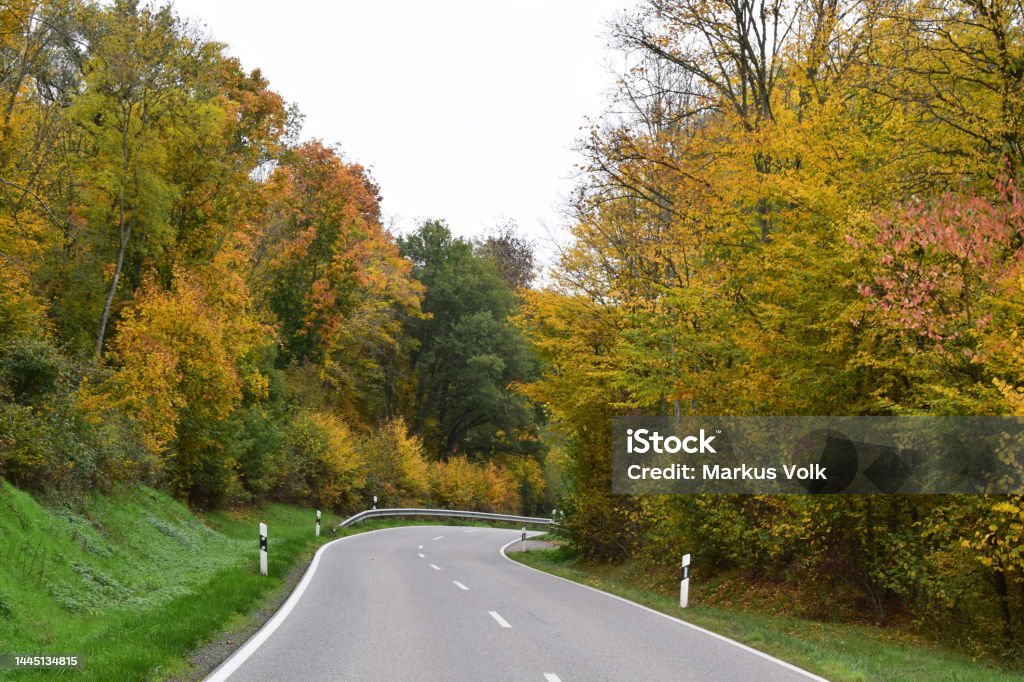 curvy country road in autumn Rhineland-Palatinate, Eifel, Elztal Asphalt Stock Photo