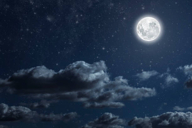 istock Backgrounds night sky with stars moon and clouds for Christmas 1445134928