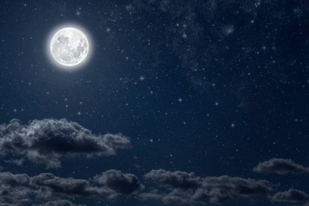 Backgrounds night sky with stars moon and clouds for Christmas stock photo