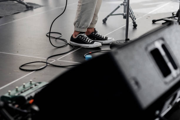 istock Rock star performing live on hard rock concert 1445136046