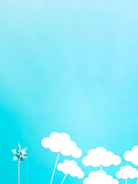 istock toy windmill and clouds moved by the wind 1445139407