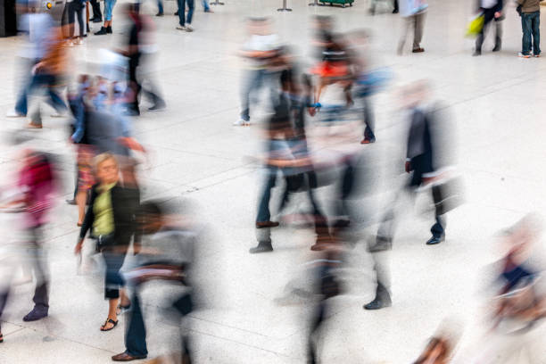 istock People walking in railroad station 1445143110