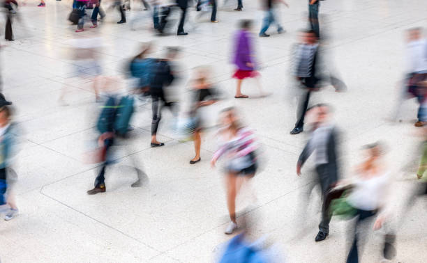 istock People walking in railroad station 1445143130