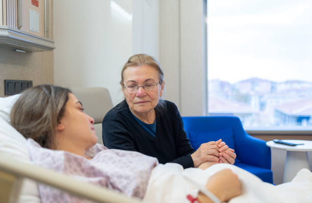 istock Mother Visiting Her Daughter At Hospital 1445144851