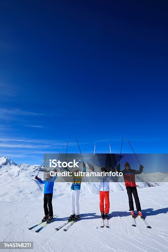 istock Friends Senior group , Men snow skier skiing, enjoying on sunny ski resorts. Skiing  against blue sky. 1445148211