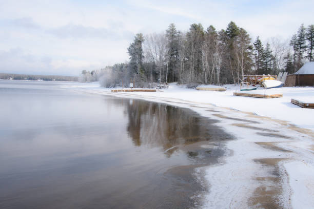 istock Canadian forest lake after the first snows 1445148228