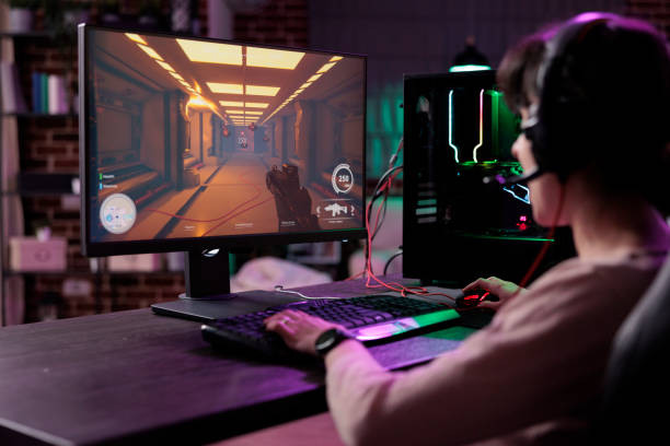 istock Young gamer having fun with action video games competition 1445148919