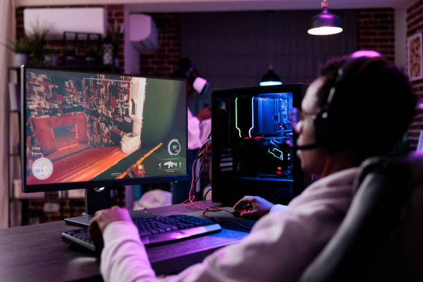 istock Internet male blogger broadcasting live video games play on pc 1445149393