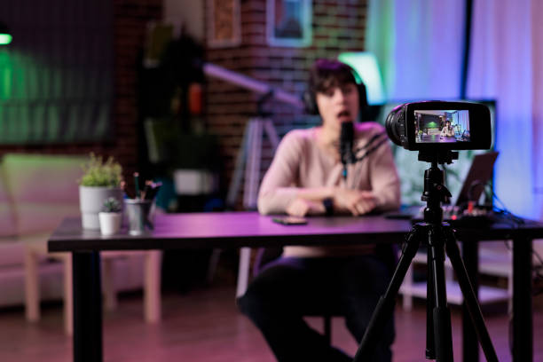 istock Content creator vlogging lifestyle podcast episode on camera 1445149435