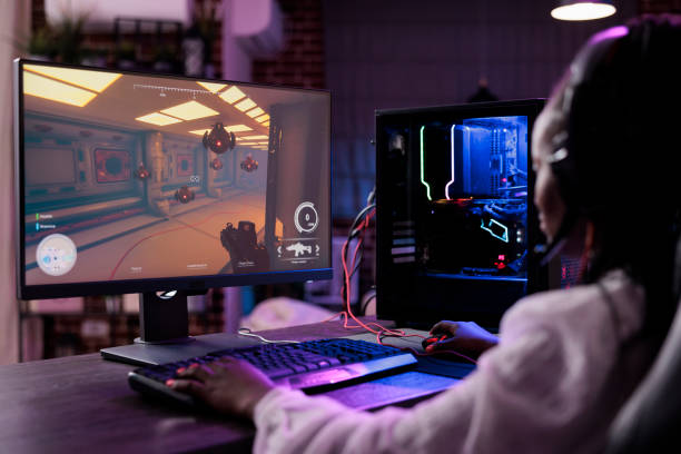 istock Modern person playing video games tournament on computer 1445149508