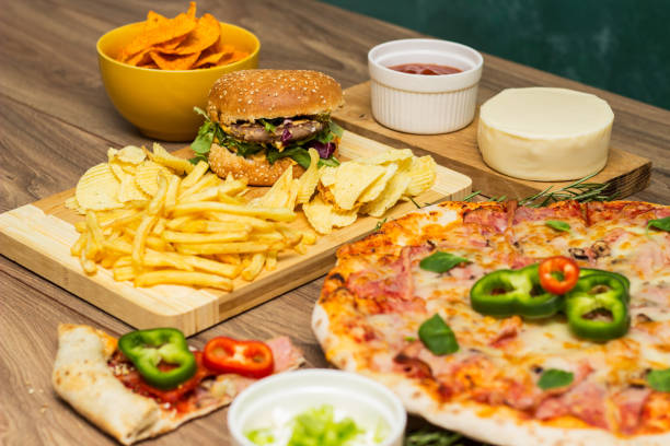 istock Tasty fast food on table 1445153298
