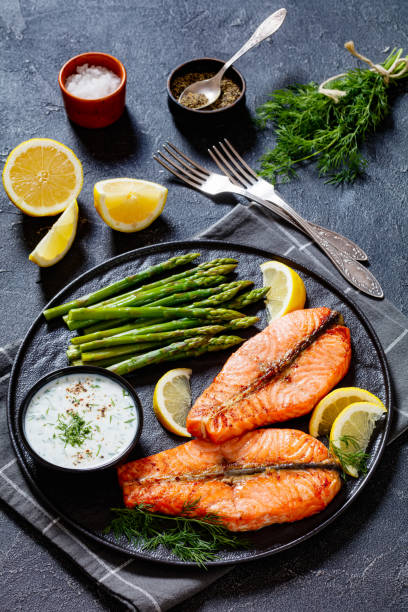 istock roast salmon steaks with asparagus and dill sauce 1445154998
