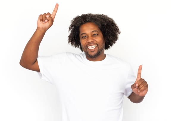 istock Excited African American man pointing up 1445155312