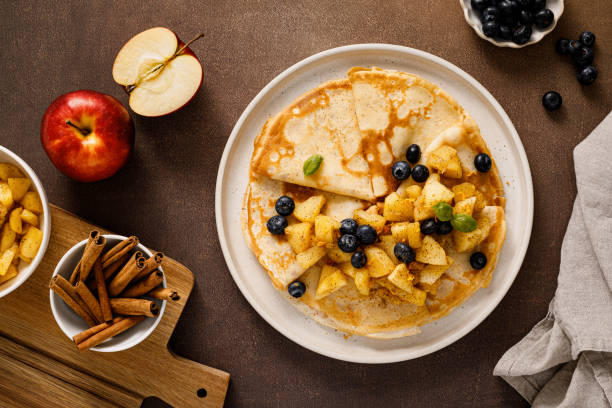 istock Crepes with caramelized cinnamon apples, top view 1445155579