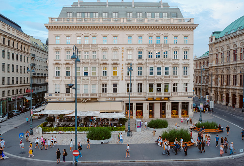 Vienna, Austria - August 27, 2022: A view of the Helmut Zilk Square, in Vienna, Austria, with the famous Hotel Sacher in the center and the Vienna State Opera on the right