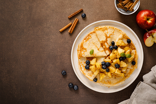 Crepes with caramelized cinnamon apples, top view