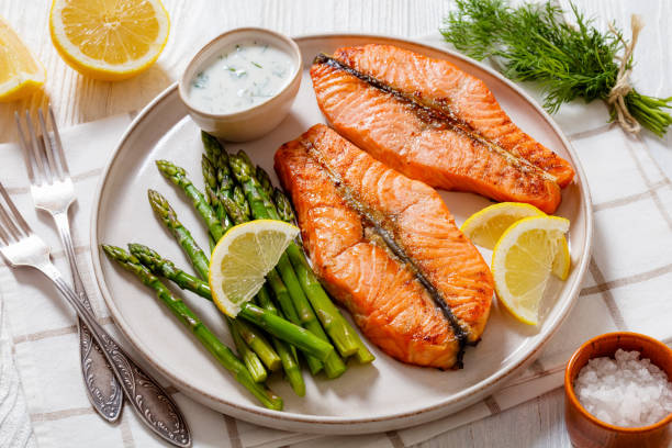 istock roast salmon steaks with asparagus and dill sauce 1445155987
