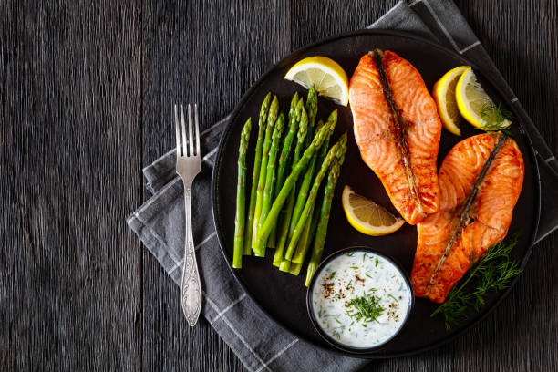 istock roast salmon steaks with asparagus and dill sauce 1445156447
