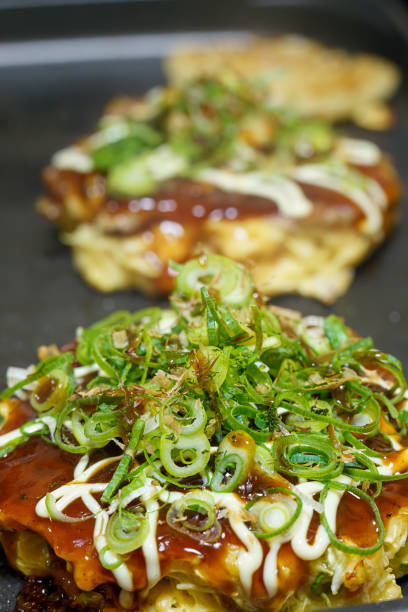 istock Japanese okonomiyaki on hot plate 1445158334