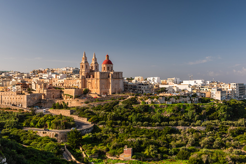 Il-Mellieha, Malta -  Mellieha town at sunny day with Paris Church on hill top.