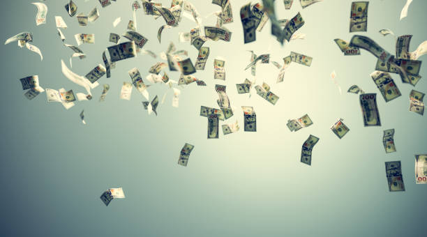 istock Money falling - one hundred US dollar bills 1445160946
