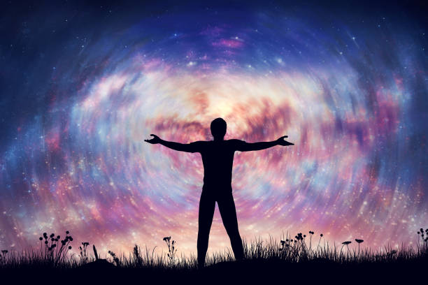 istock Happy man uniting with universe. Night sky with spiral nebula and stars. 1445161873