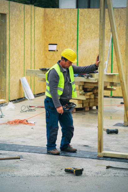 istock Man controling the crane on construction site 1445162050