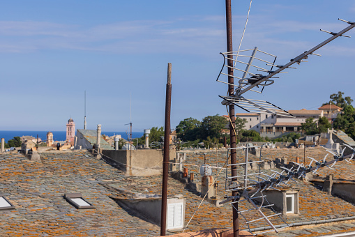 roof tops and towers of the Église Saint-Jean-Baptiste de Bastia in the city center of Bastia; Bastia, France