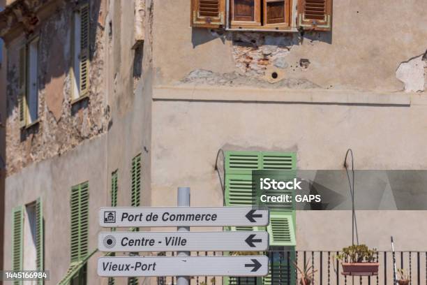 Directional Signs In The Old Town Of Bastia Stock Photo - Download Image Now - Architecture, Arrow Symbol, Bastia