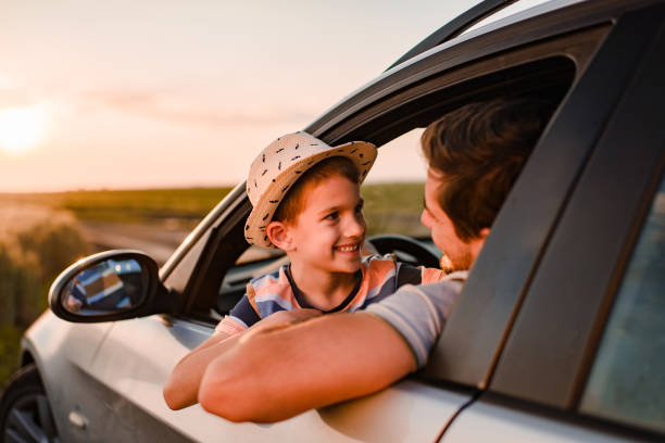 istock Beautiful father and son enjoying on a road trip 1445167032
