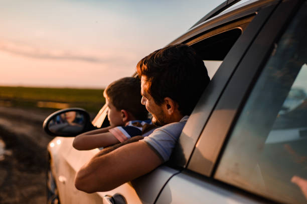 istock Beautiful father and son enjoying on a road trip 1445167712