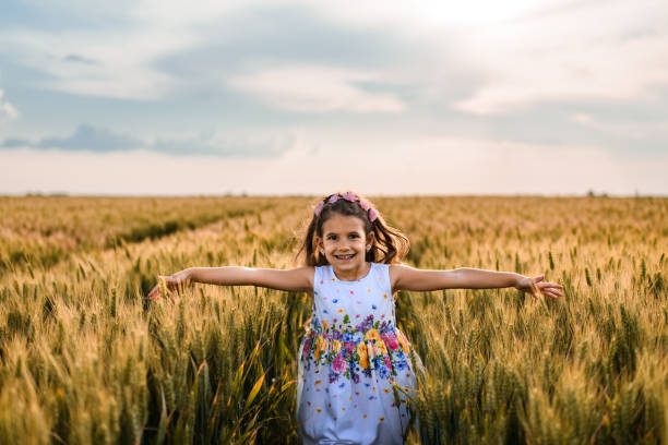istock Happy girl enjoying nature 1445167947