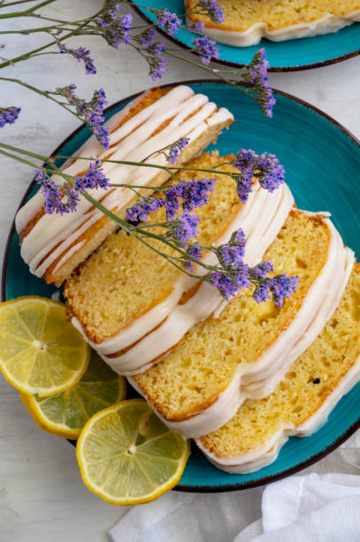 istock Lemon fruit cake on plate with lemon slices. Delicious breakfast or tea time. Lemon cake. 1445169367