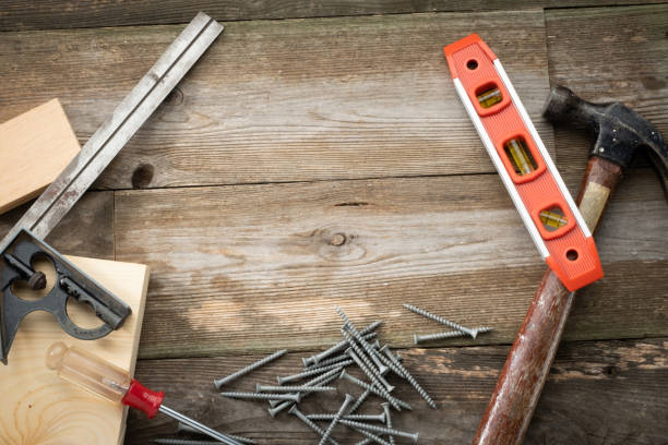 istock Rustic Wooden Background with Common Tools Around the Edges with Room for Text 1445176983