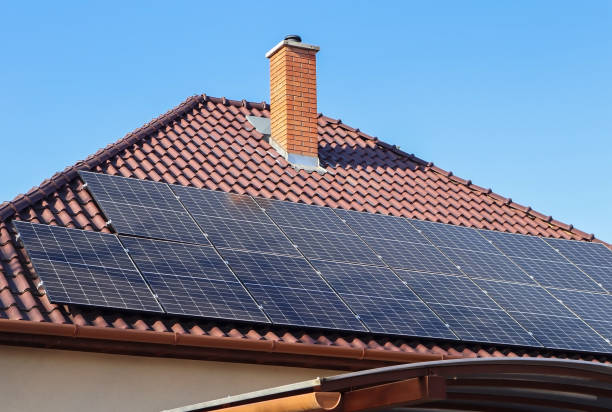 istock Solar panels on the top of a building 1445177409