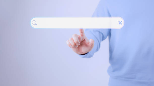istock Man hand presses the information search button on computer touch screen. Technology, searching system and internet concept, copy space. 1445179803