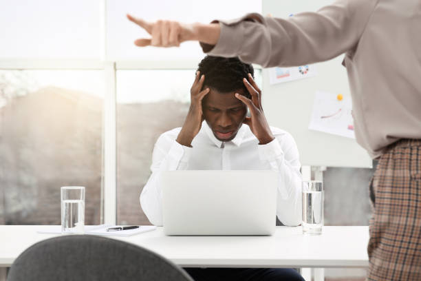 istock African American man suffering from racial discrimination at work 1445180918