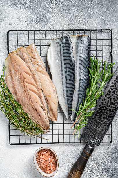 istock Fresh sliced mackerel fillet fish. White background. Top view 1445181169