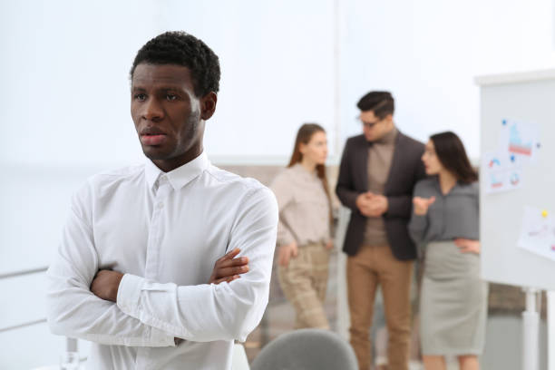 istock African American man suffering from racial discrimination at work 1445181711