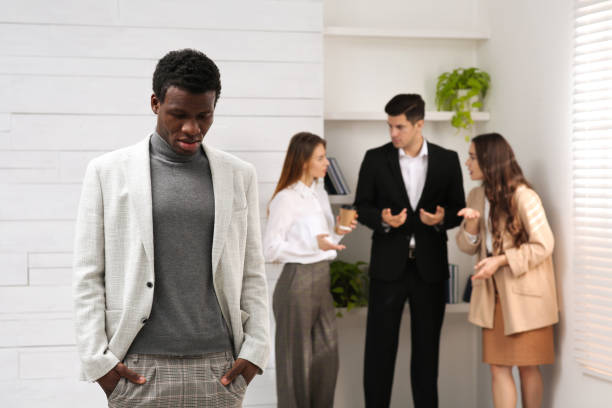African American man suffering from racial discrimination at work