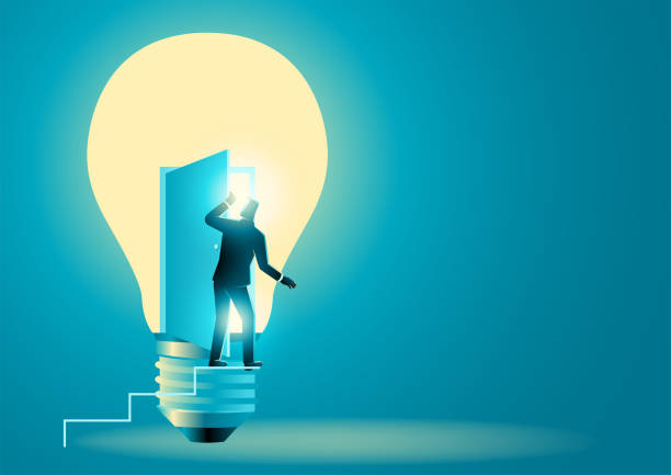 istock Businessman on stairs peek into the light bulb 1445186715