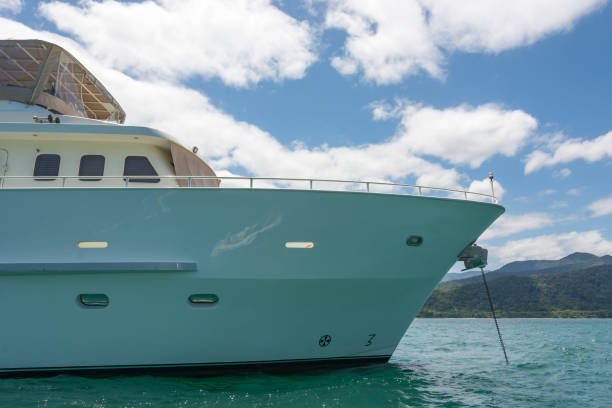 yacht anchored in the bay. turquoise sea, blue sky clouds. - sao paulo south america marina southeastern region imagens e fotografias de stock