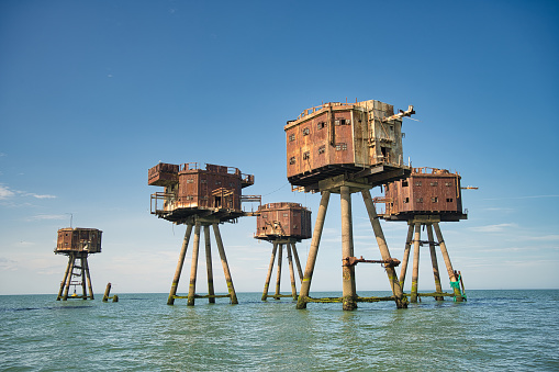 The Maunsell Forts are armed towers built during the Second World War to help defend the United Kingdom. They were operated as army and navy forts, and named after their designer, Guy Maunsell. Decommissioned in the late 1950s and later used for other activities including pirate radio broadcasting. One of the forts is managed by the unrecognised Principality of Sealand. One of the seven towers collapsed in 1963 when fog caused the ship Ribersborg to stray off course and collide with one of the towers.