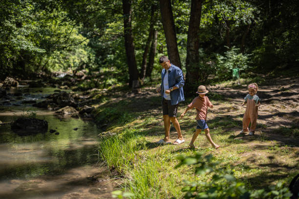istock Happy family spending day in nature 1445191211