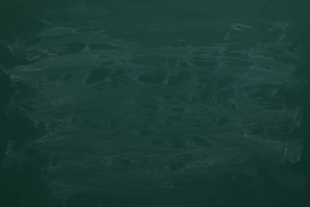 istock Dirty green chalkboard as background. School equipment 1445192000