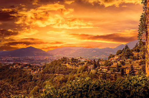 View of the hills surrounding the city of Bergamo in Lombardy (Italy) pictured at sunset.